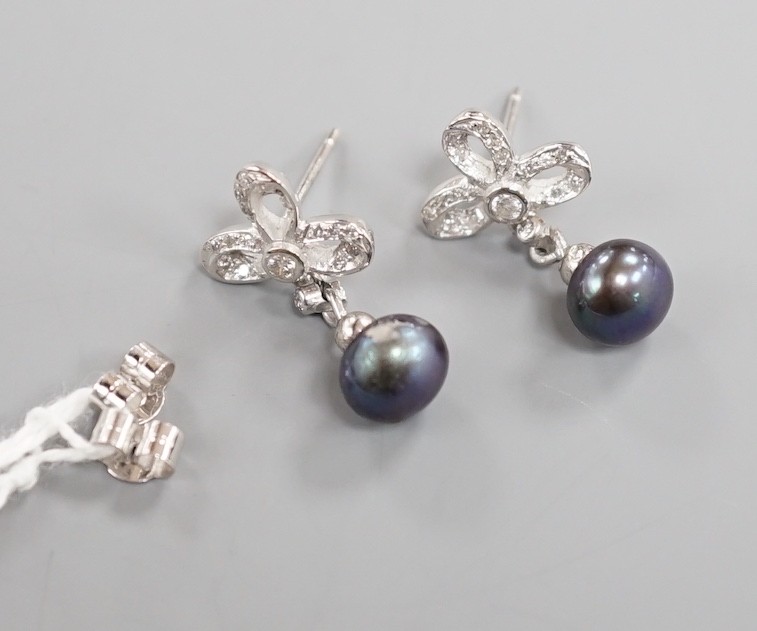 A modern pair of 750 white metal, Tahitian cultured pearl and diamond set drop earrings, 20mm, gross weight 3.8 grams.